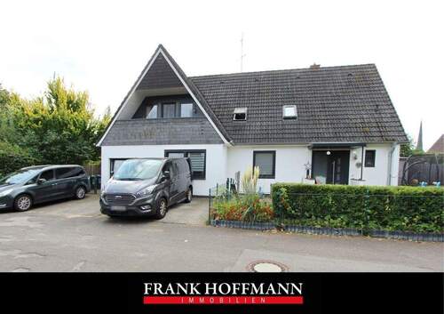 V10357 Titelbild - Attraktives Zweifamilienhaus - vermietet - mit Wärmepumpe und neuen Fenstern in Barmstedt