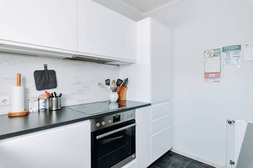 Küche mit modernen Elektrogeräten - Reihenmittelhaus mit 100,70 m&sup2; in Reppenstedt zum Kaufen