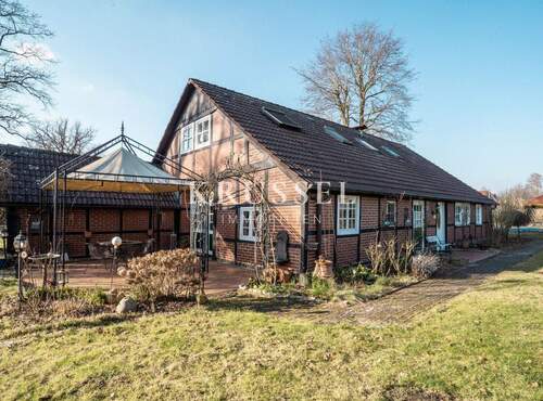 Seitenansicht mit überdachter Sonnenterrasse - 1 Zimmer Einfamilienhaus zum Kaufen in Herzlake / Felsen