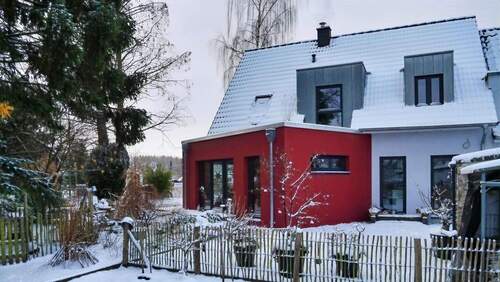 Winterfoto Hinteransicht - Doppelhaushälfte mit 124,40 m&sup2; in Lübeck zum Kaufen