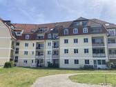 Außenansicht - Frisch sanierte 3-Raumwohnung mit Balkon, TG-Stellpl. & Fahrstuhl!