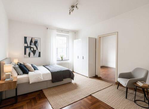 Schlafzimmer KI-Bild - Mehrfamilienhaus, Wohnhaus in Neuss zum Kaufen