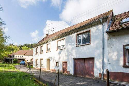 Hausansicht - Einfamilienhaus mit 95,00 m&sup2; in Offenbach-Hundheim zum Kaufen