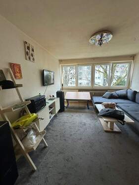 Wohnzimmer.jpeg - 1 Zimmer Etagenwohnung in Baden-Baden