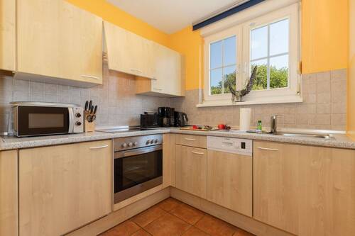 Die ausgestattete Einbauküche - 