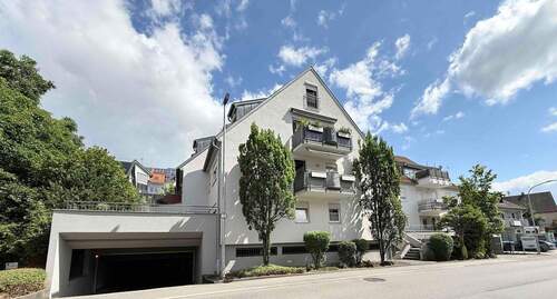 Hausansicht 1 - Charmantes, loftartiges Apartment mit Tiefgarage - vermietetes Investment in zentraler Lage