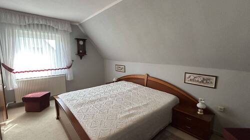 Schlafzimmer im Dachgeschoss - 