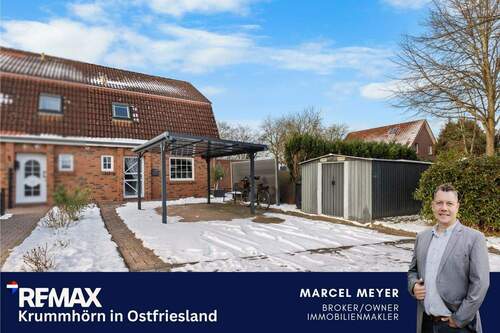 Titelbild - Charmantes Reihenendhaus mit großem Grundstück und viel Potenzial in Borssum