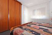 Schlafzimmer mit Balkon - 