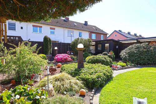 Liebevoller Ziergarten - Reihenendhaus mit 95,00 m&sup2; in Lübbecke zum Kaufen