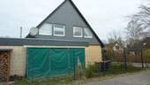 Seitenansicht mit Kaminholzdepot - 4 Zimmer Etagenwohnung in Tespe