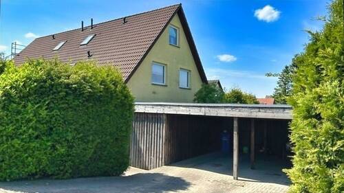 straßenseitige Gebäudeansicht - 5 Zimmer Doppelhaushälfte in Satow