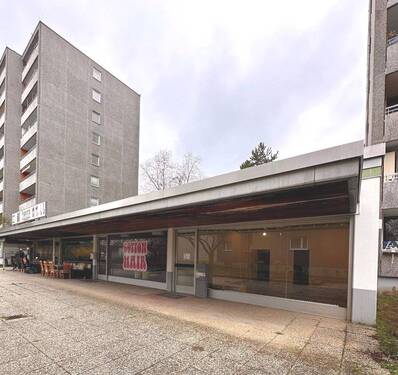 Außenansicht - **GEWERBEFLÄCHE IN EINER KLEINEN LADENZEILE IN DER GROPIUSSTADT**