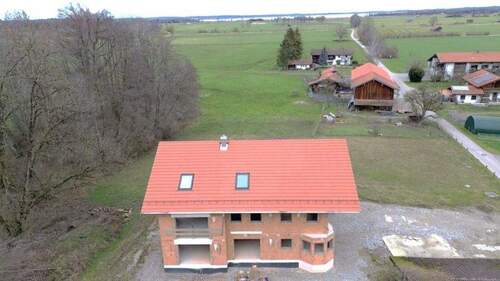 Rohbau - 1 Zimmer Mehrfamilienhaus, Wohnhaus in Übersee