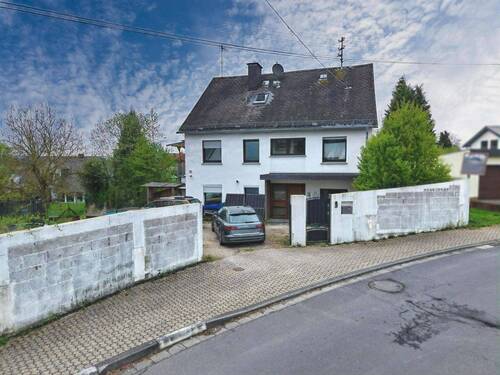 Frontansicht - Vielseitiges Einfamilienhaus mit Einliegerwohnung - großzügig, flexibel und familienfreundlich!