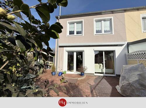 H&T Immobilien - Reihenendhaus in Bremen - Reihenendhaus mit Kamin, Garten & viel Wohnkomfort