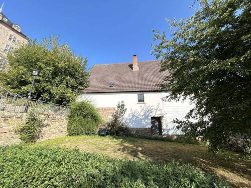 Seitenansicht - 6 Zimmer Mehrfamilienhaus, Wohnhaus in Diemelstadt-Rhoden