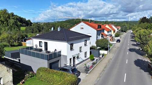 Ansicht 2 - Wohnen in zentraler Lage Modernes Einfamilienhaus zum Wohlfühlen