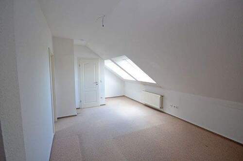 Zimmer im Dachgeschoss - 