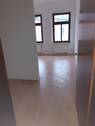 Blick in Küche und Wohnzimmer - 