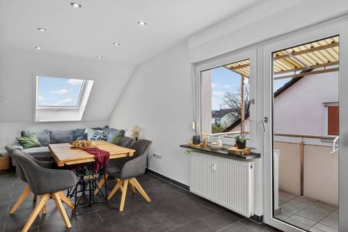Dachgeschoss Essbereich und Balkon - 