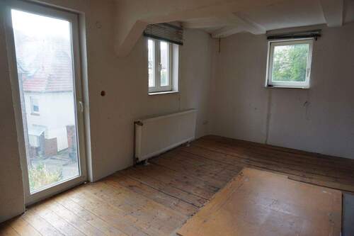 Wohnzimmer EG.JPG - 1 Zimmer Mehrfamilienhaus, Wohnhaus in Homberg