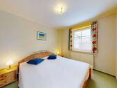 Schlafzimmer 1 - Etagenwohnung mit 61,00 m&sup2; in Ostseeheilbad Zingst zum Kaufen