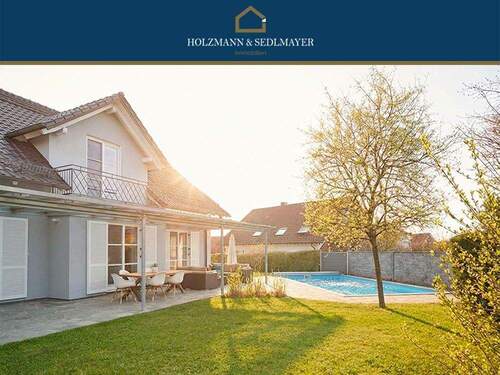 Titelfoto Frühjahr - Wohnen mit Anspruch: Repräsentatives Einfamilienhaus mit Pool und hochwertiger Ausstattung