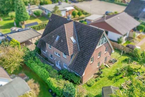 Außenansicht - Mehrfamilienhaus, Wohnhaus zum Kaufen in Wrist