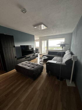 Wohnzimmer - Moderne 3,5(4)-Zimmer-Wohnung mit Loggia in naturnaher Lage mit besonderem Wohlfühlfaktor