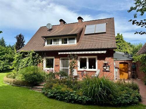 Rückseite mit Terrasse - 