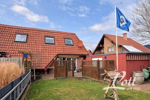 Gartenansicht - Doppelhaushälfte mit 101,40 m&sup2; in Augustfehn zum Kaufen