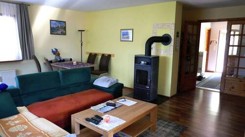 Wohnzimmer mit Kaminofen - 
