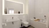 Ein modern gefliestes Badezimmer, inklusive Wanne - 