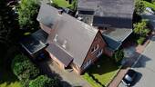 Luftbild - 6 Zimmer Mehrfamilienhaus, Wohnhaus zum Kaufen in Westerrönfeld