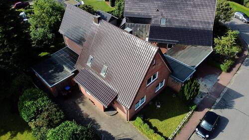 Luftbild - 6 Zimmer Mehrfamilienhaus, Wohnhaus zum Kaufen in Westerrönfeld