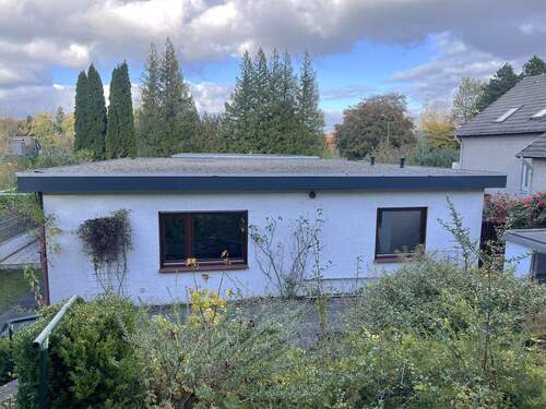 Rückansicht - 4 Zimmer Bungalow zum Kaufen in Flensburg