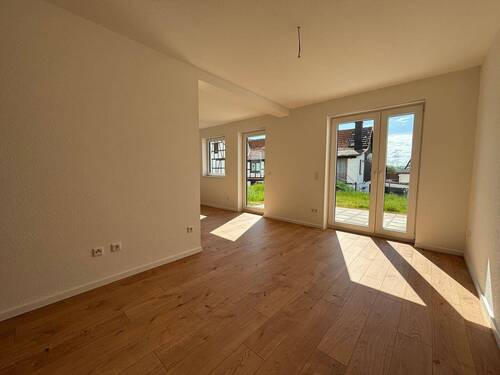 Wohnzimmer - Doppelhaushälfte mit 135,00 m&sup2; in Weimar / Niederwalgern zum Kaufen