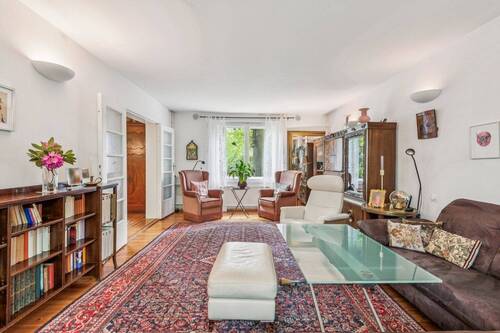 Wohnzimmer im Erdgeschoß - Einfamilienhaus mit 135,00 m&sup2; in Berlin zum Kaufen