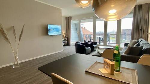 Wohnzimmer mit großer Loggia - Etagenwohnung mit 83,50 m&sup2; in Wismar zum Kaufen