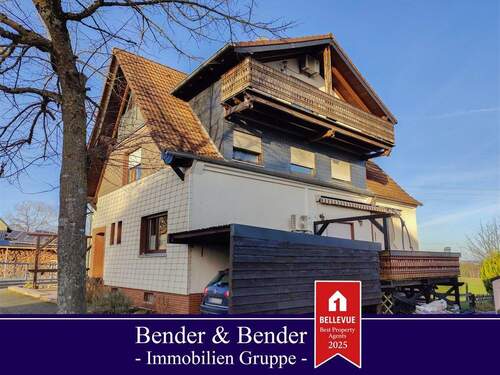 www.bender-immobilien.de - 4-Familienhaus mit 2 Garagen und Carport nahe Flammersfeld!