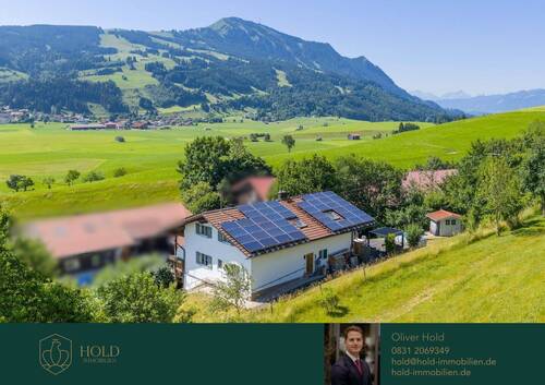 Titelbild - Alpenfeeling pur: Zweifamilienhaus mit Bergblick in Rettenberg