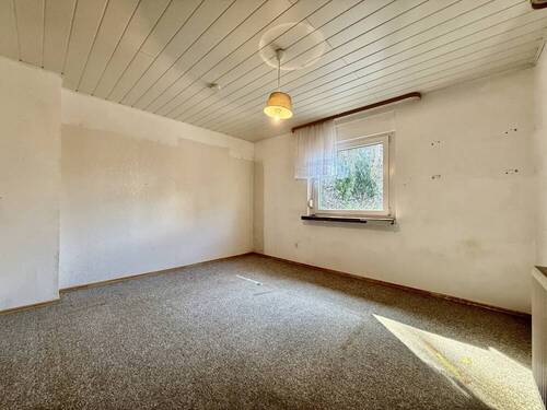 Schlafzimmer I EG - Mehrfamilienhaus, Wohnhaus mit 146,00 m&sup2; in Laudenbach zum Kaufen