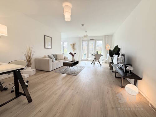 Wohnzimmer und Essbereich - 3 Zimmer Etagenwohnung in Norderstedt