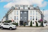 Frontansicht - Moderne 3-Zimmer-Wohnung mit Terrasse, Tiefgaragenstellplatz und barrierearmer Ausstattung
