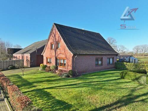 seitliche Ansicht - 7 Zimmer Mehrfamilienhaus, Wohnhaus zum Kaufen in Uplengen / Bühren