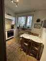 Küche mit Sitzmöglichkeit - 