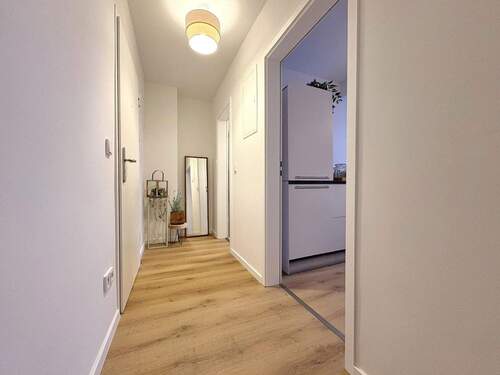 Flur zur Küche/Bad - Etagenwohnung mit 73,00 m&sup2; in Essen zum Kaufen