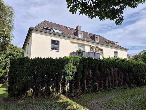 Hausansicht Rückseite - Etagenwohnung mit 79,00 m&sup2; in Dresden zum Kaufen