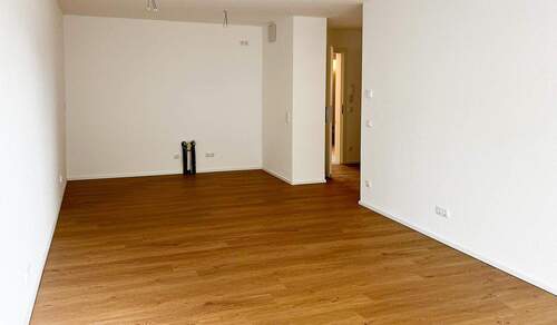 Wohnbereich mit Küchenanschlüssen - 